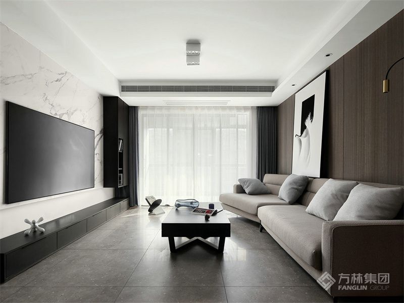 客厅电视背景墙采用白色纹理大理石,沙发背景采用深咖色饰面板,空间感